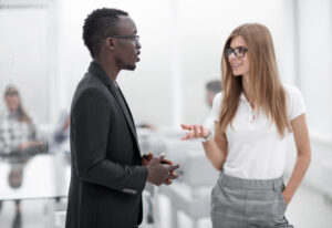 Man and woman having a discussion at work