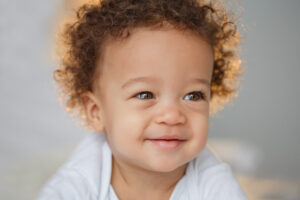 Cute baby with fluffy hair