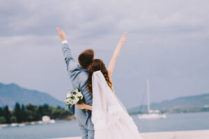 wedding couple celebrating on beach