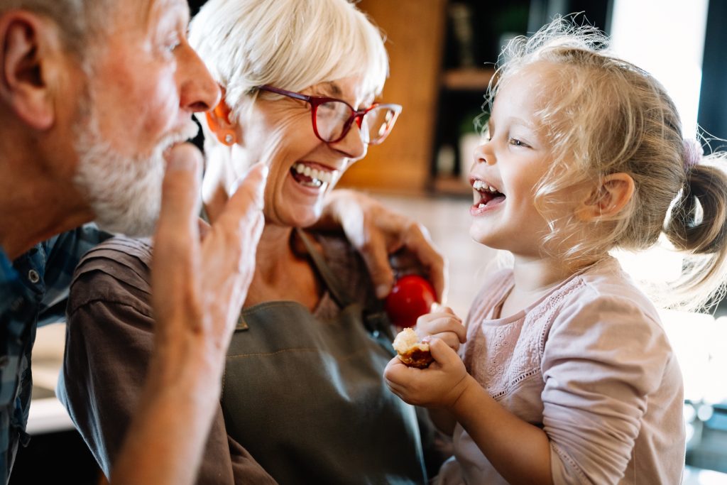 Baby Boomers Playing Game with Grandchildren